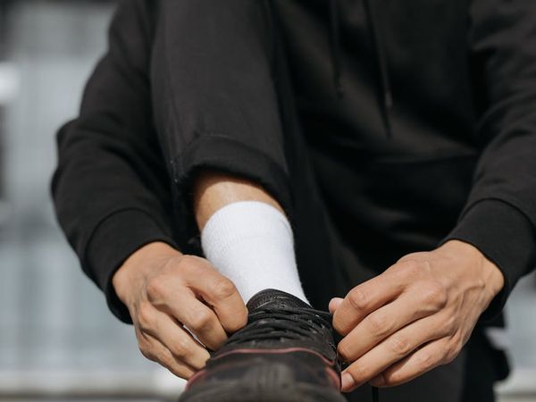 Close-up shot focusing on the stability of feet during an exercise.